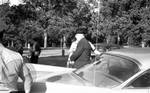 Govenor Ross Barnett exiting car by Edwin E. Meek