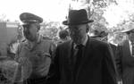Govenor Ross Barnett escorted by Mississippi Highway Patrol officer by Edwin E. Meek