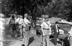 Mississippi Highway Patrol standing on sidewalk with wood batons by Edwin E. Meek