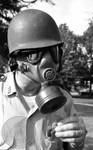 Mississippi Highway Patrol member with gas mask by Edwin E. Meek