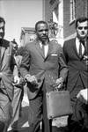 James Meredith exits Baxter Hall with escorts while military police guard: Image 4 by Edwin E. Meek