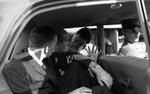Nicklos Katzenback and James McShane in car by Edwin E. Meek
