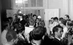 Crowd of news reporters gather as James Meredith exits room: Image 1 by Edwin E. Meek