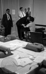 News reporters register in Lyceum Board Room: Image 1 by Edwin E. Meek