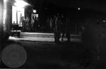 Military troops on campus at night: Image 5 by Edwin E. Meek