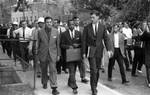 James Meredith, James McShane, and John Doar walking through campus: Image 4 by Edwin E. Meek