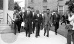James Meredith, James McShane, and John Doar walking through campus: Image 6 by Edwin E. Meek