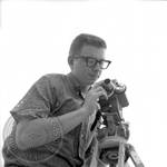 Unidentified cameraman by Edwin E. Meek