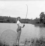 Unidentified young woman fishing: Image 2 by Edwin E. Meek