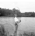Unidentified young woman fishing : Image 3 by Edwin E. Meek