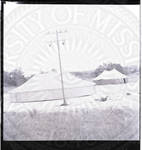 Two tents and light post [located either at the National Guard Armory on University Drive, or Camp Ivanhoe]. by William T. Miles