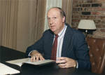 Bill Miles at his desk, from See Tupelo magazine. by Author Unknown