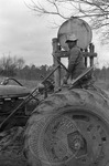 Unidentified man on tractor, image 002
