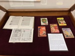 Display case. Arts, Crafts, and Paperbacks by University of Mississippi. Department of Archives and Special Collections