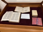 Display case. Above the Fold: the Shapes and Sizes of Books by University of Mississippi. Department of Archives and Special Collections