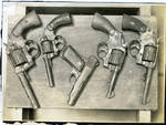 Confiscated hand guns by Martha Alice Stewart