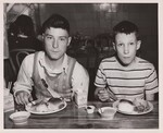 Harvey Proctor, 15, and David Wickens, 10, turkey lunch, Oakton Elem School, Fairfax County, Virginia. by USDA