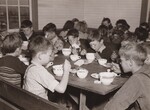 School children enjoying a hot school lunch. Rockbridge, Virginia. by USDA