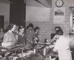 Serving line during school lunch period at Spaulding High School. Rochester, N.H by USDA