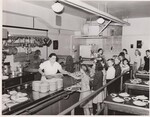 The U. S. Department of Agriculture helps the Illinois Public Aid Commission in providing free lunches in this Chicago, Illinois, public school. by USDA
