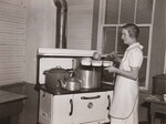 The cook, who with 2 helpers, prepares and serves school lunch to 150 students. Mountain View School, Rockbridge County, Va. by USDA