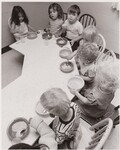 Children of migrant farm workers having breakfast at the Woodburn Day Care Center, whose food program is partially funded by USDA's Food and Nutrition Service. Woodburn, OR by USDA