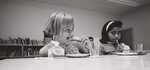 These schoolchildren in Laredo, Texas are enjoying a snack with milk provided by the U.S. Department of Agriculture's School Milk Program. SCHOOL BREAKFAST United States Department of Agriculture Office of Information Laredo, Texas May 13, 1967. by USDA