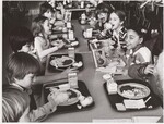 Elementary school children eating lunch at Mosby Woods Elementary School. Fairfax, VA by USDA