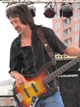 Mark Bumgarner with Jimmy Thackery and the Drivers at the Riverfront Blues Festival by Gary Saretzky