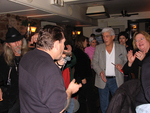 Steve Guyger playing harmonica by Gary Saretzky
