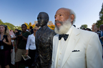 James Meredith next to the Meredith statue at UM by Ole Miss Digital Imaging Services