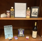 Display case. Cure-Alls, Tonics, and Hoodoo by University of Mississippi. Libraries. Archives and Special Collections.