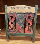 Tribute to Alex "Rice" Miller. Chair back. by University of Mississippi. Libraries. Archives and Special Collections.