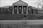 Girls Jogging, University of Mississippi. by Ken Sallis