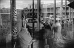 Reflections in a Boutique Window, Oxford Courthouse Square. by Evan Hatch