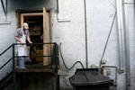 Worker in Alley Behind Ajax Diner by Meghan Leonard