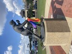 Elvis with Pride flag, side view by Amy McDowell
